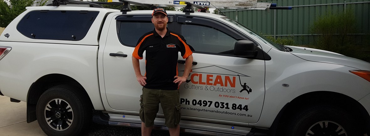 Steve in front of his iClean Gutters and Outdoors vehicle