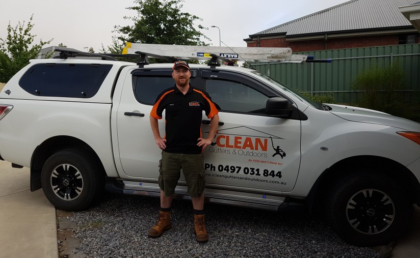 Steve in front of his iClean Gutters and Outdoors vehicle